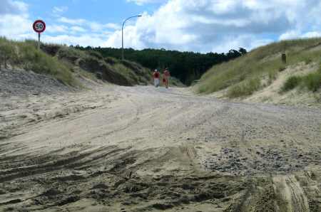 The paved ramp at Waipapakauri which descends onto the wet hard-packed sand