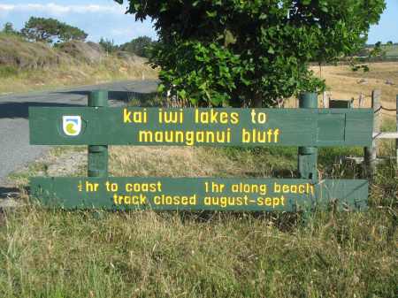 Signs for the track that leads from near Lake Waikar over to the Tasman Sea