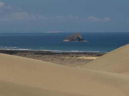 Atop the Te Paki dunes looking out over 90-Mile Beach to the archway island