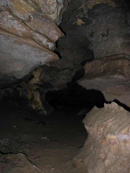 The sandy beach area inside Okupata Cave