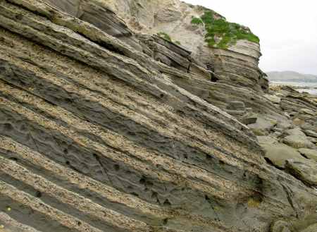 The striated rock of Tuahine Point.
